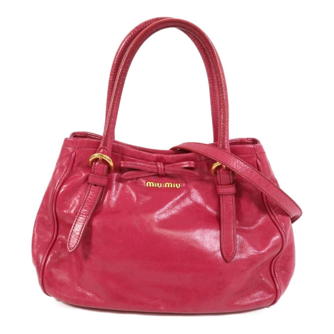 Miu Miu Pink Calfskin 2 Way Shoulder Bag GHW: Miu Miu Pink Calfskin 2 Way Shoulder Bag GHW This Miu Miu 2-way shoulder bag is crafted from pink calfskin leather, offering both style and versatility. The bag features gold-tone hardware and a struc