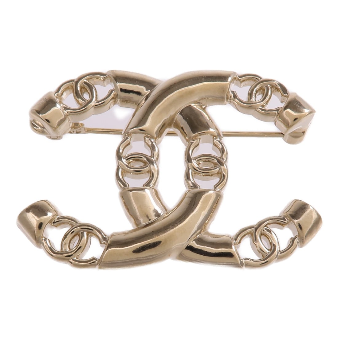 Gold Tone Brooch with CC Logo by CHANEL: Gold Tone Brooch with CC Logo by CHANEL This CHANEL CC brooch features a gold-tone metal finish and classic interlocking CC design. Designed for women, it does not include a main stone and is made in 