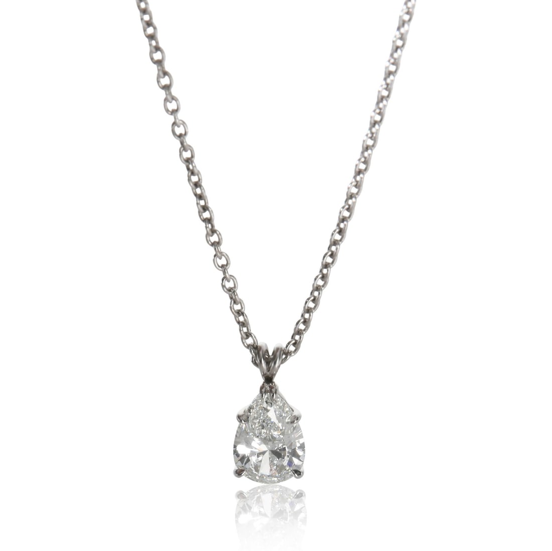 Harry Winston Solitaire Pear Diamond Pendant Necklace in Platinum with GIA Certificate: Harry Winston Solitaire Pear Diamond Pendant Necklace in Platinum with GIA Certificate This Harry Winston pendant features a pear-shaped diamond weighing 1.01 carats, set in platinum with a 950 purity