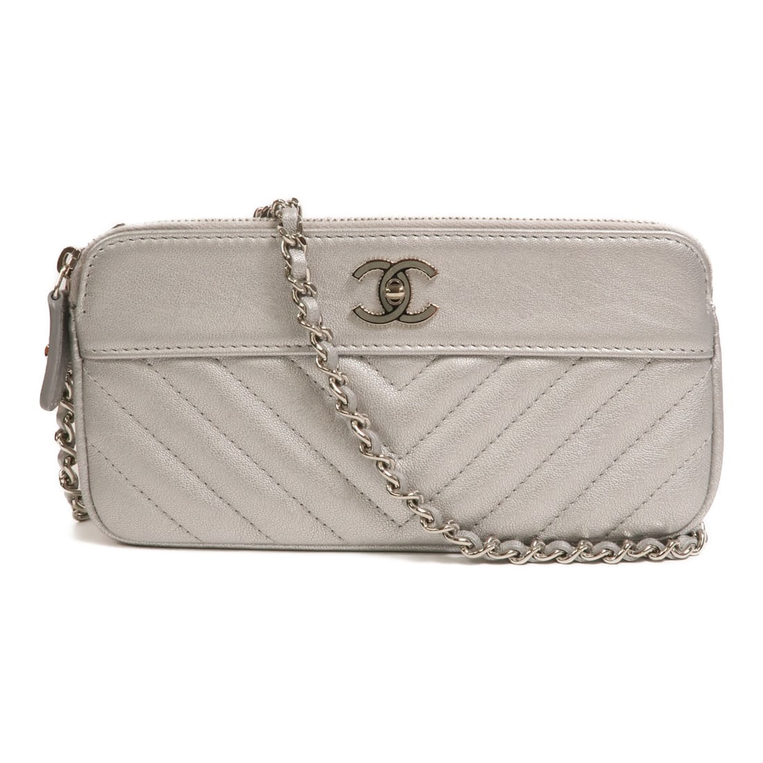 CHANEL Silver Calfskin Wallet On Chain Shoulder Bag: CHANEL Silver Calfskin Wallet On Chain Shoulder Bag This CHANEL Wallet On Chain shoulder bag is crafted from calfskin leather in a sleek silver color. Designed for women, it features a compact silhoue
