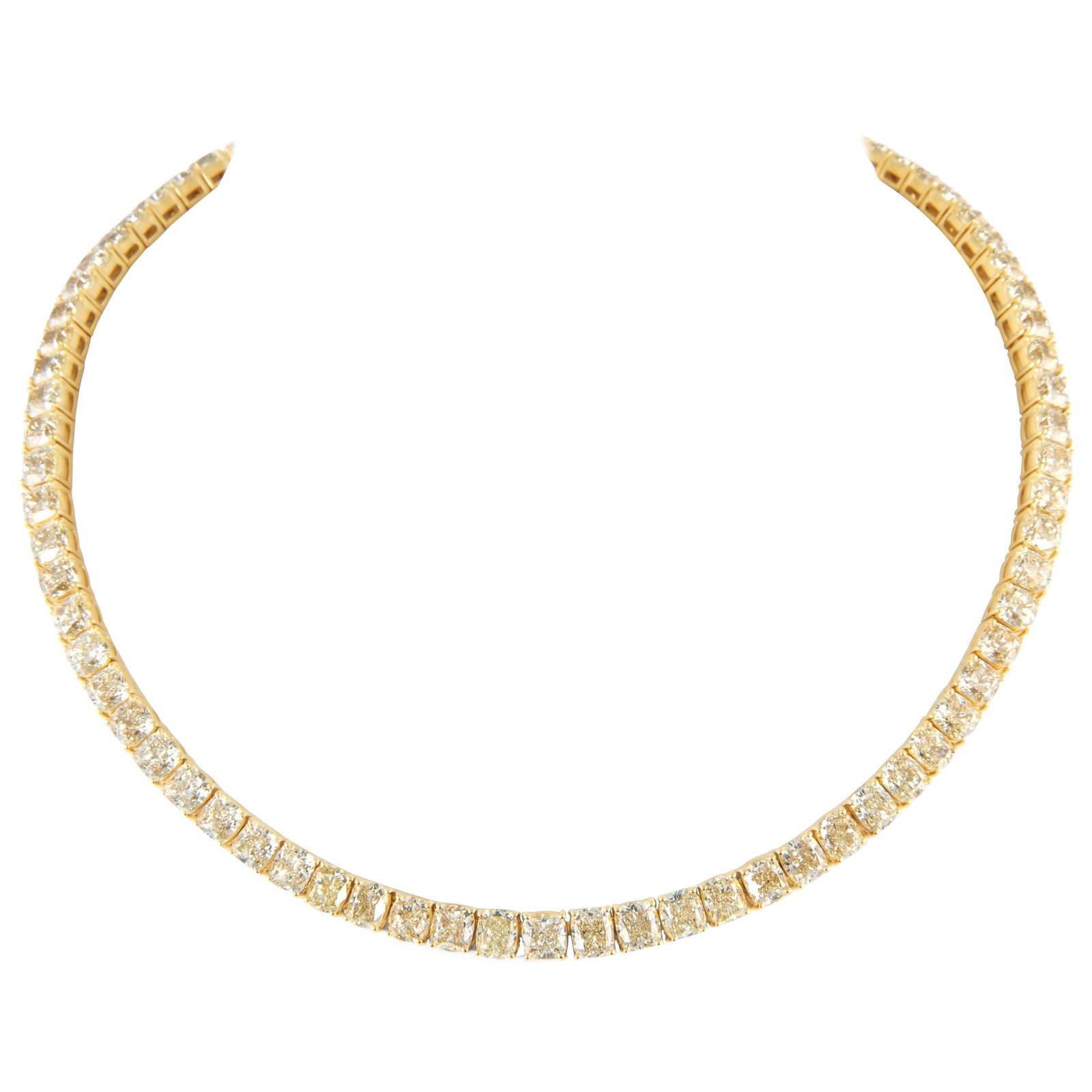 53.99ct Yellow Diamond Tennis Necklace 18k Gold: 53.99ct Yellow Diamond Tennis Necklace 18k Gold This stunning tennis necklace features a total weight of 53.99 carats of exquisite natural cushion-cut yellow diamonds, prong set in luxurious 18k yello