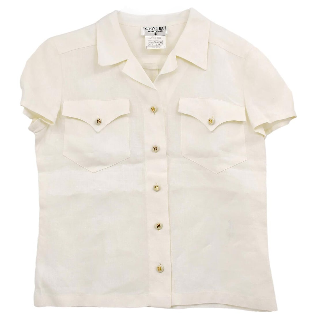 Chanel Vintage White Linen Short Sleeve Shirt 97P Size 38: Chanel Vintage White Linen Short Sleeve Shirt 97P Size 38 This vintage Chanel short sleeve shirt is crafted from 100% linen, making it a perfect choice for casual occasions. The shirt features a class