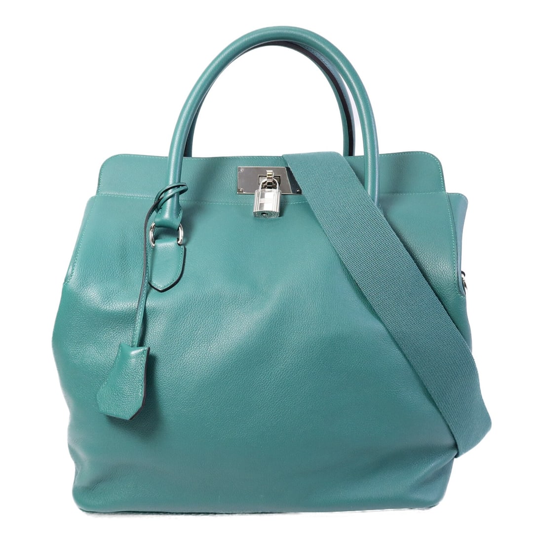 Hermes Toolbox 33 Evercolor Leather 2 Way Shoulder Bag Malachite: Hermes Toolbox 33 Evercolor Leather 2 Way Shoulder Bag Malachite This Hermes Toolbox 33 is a versatile 2-way shoulder bag crafted from Evercolor calfskin leather in a striking malachite green hue. Des