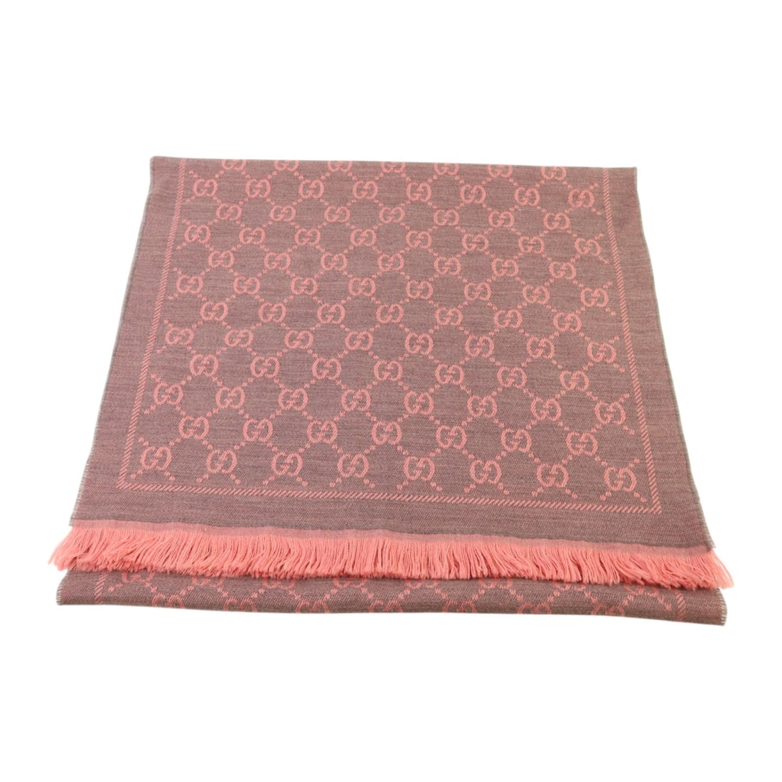 Gucci Pink and Gray Wool GG Pattern Scarf 48x180cm Italy: Gucci Pink and Gray Wool GG Pattern Scarf 48x180cm Italy This GUCCI GG scarf features a pink and gray color scheme and is crafted from wool. Designed for women, it offers a stylish accessory option su