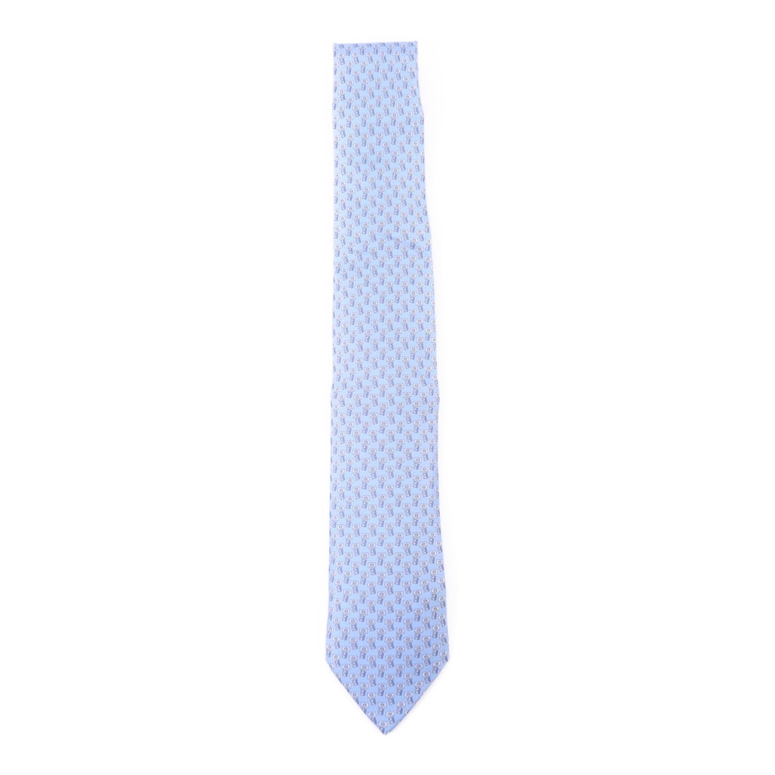 Blue Silk Tie from Hermes France: Blue Silk Tie from Hermes France This Hermes necktie is crafted from high-quality silk and features a classic blue color. Made in France, it offers a refined and sophisticated accessory for a regular 