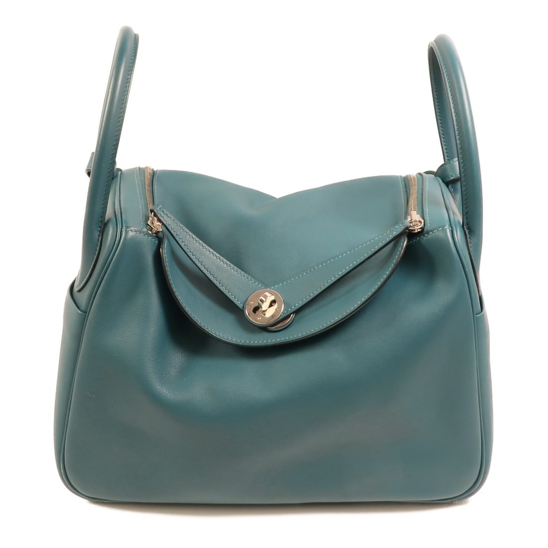Hermes Lindy 30 Blue Swift Leather Shoulder Bag with Palladium Hardware: Hermes Lindy 30 Blue Swift Leather Shoulder Bag with Palladium Hardware This Hermes Lindy 30 is a two-way shoulder bag crafted from Veau Swift calfskin leather in a striking blue shade. Designed for v