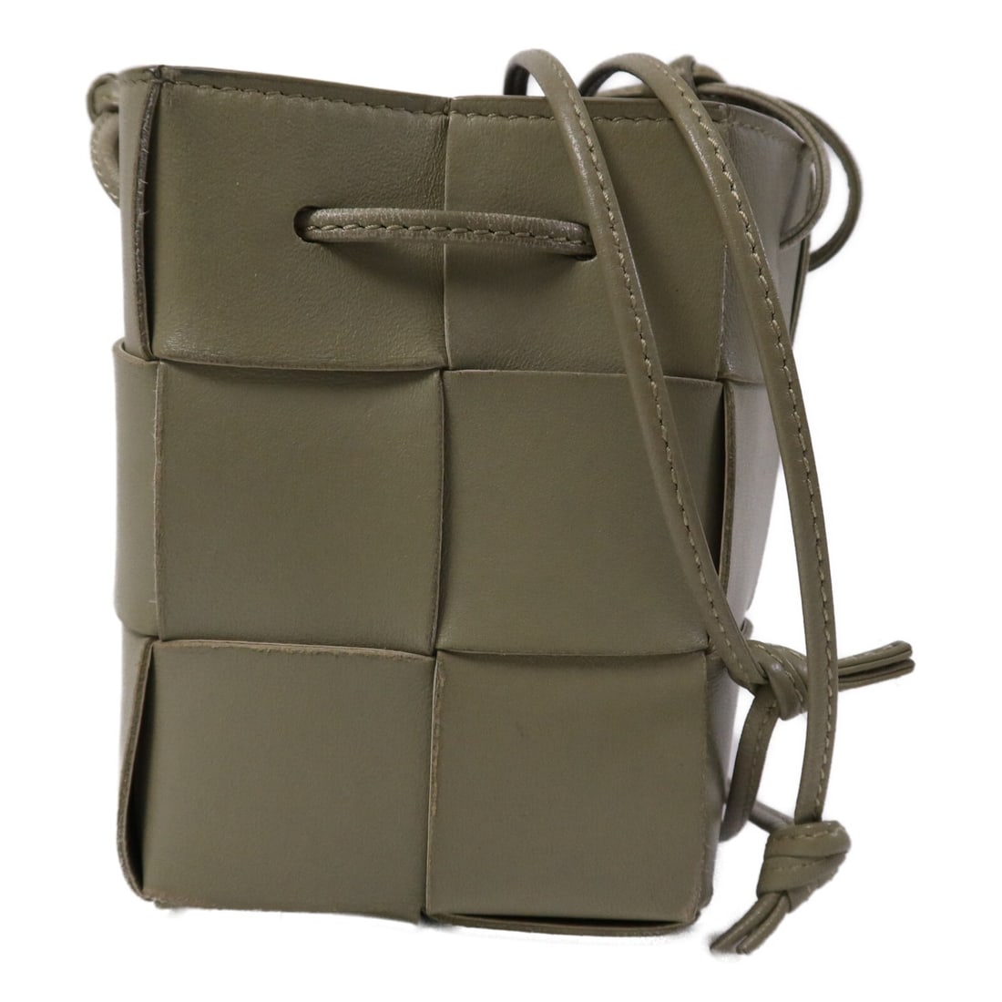 Bottega Veneta Small Cassette Khaki Calfskin Leather Unisex Shoulder Bag: Bottega Veneta Small Cassette Khaki Calfskin Leather Unisex Shoulder Bag This BOTTEGA VENETA Small Cassette Bucket Shoulder Bag features a khaki calfskin leather exterior and is designed for unisex us
