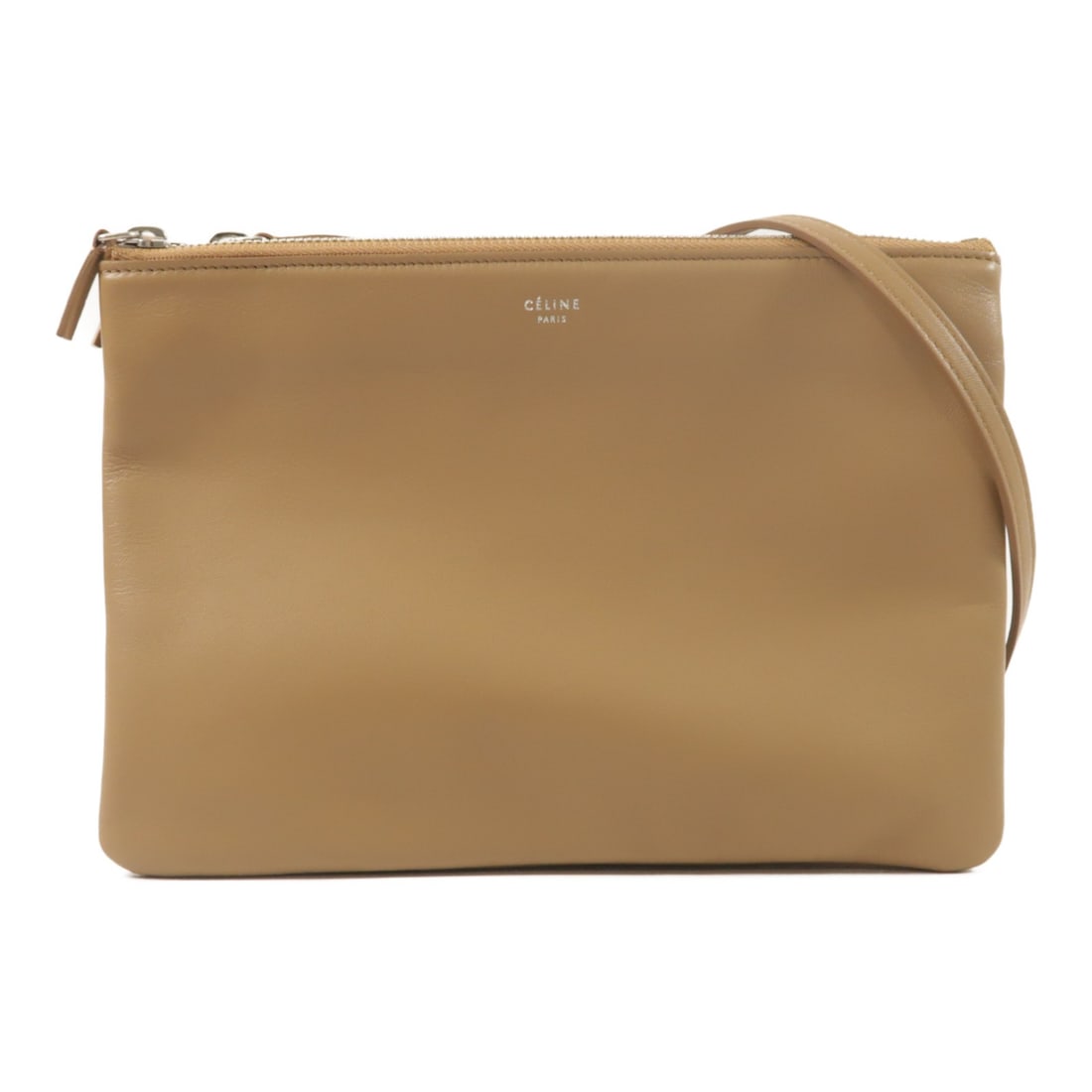 Beige CELINE Trio Lambskin Shoulder Bag: Beige CELINE Trio Lambskin Shoulder Bag This CELINE Trio Large Shoulder Bag features premium beige lambskin leather and a sleek, minimalist design. Crafted for women, the bag offers a sophisticated lo