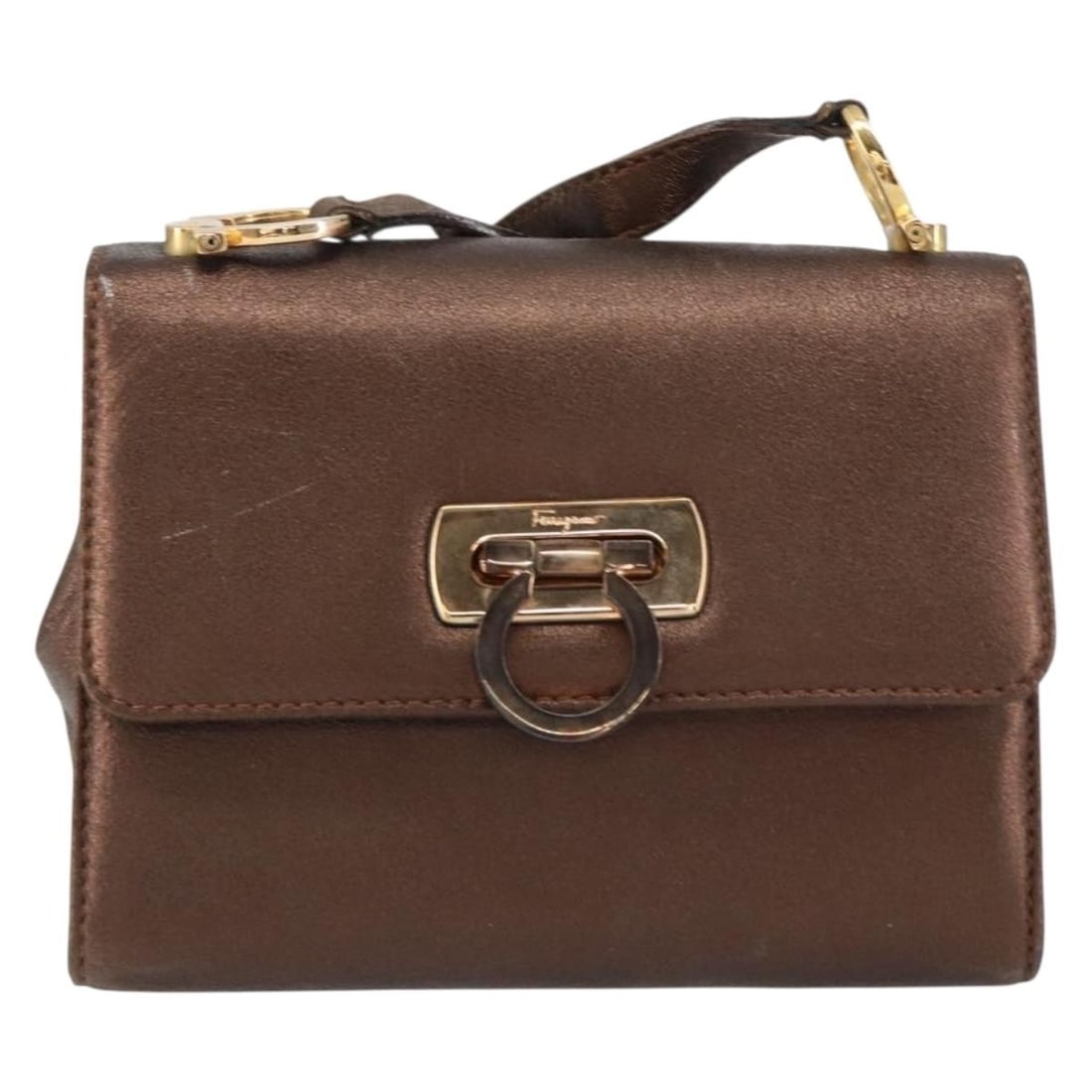 Leather Gancini Shoulder Bag by Salvatore Ferragamo Gold Tone: Leather Gancini Shoulder Bag by Salvatore Ferragamo Gold Tone This Salvatore Ferragamo Gancini shoulder bag is crafted from leather in a gold color. Designed for women, the bag features a compact size