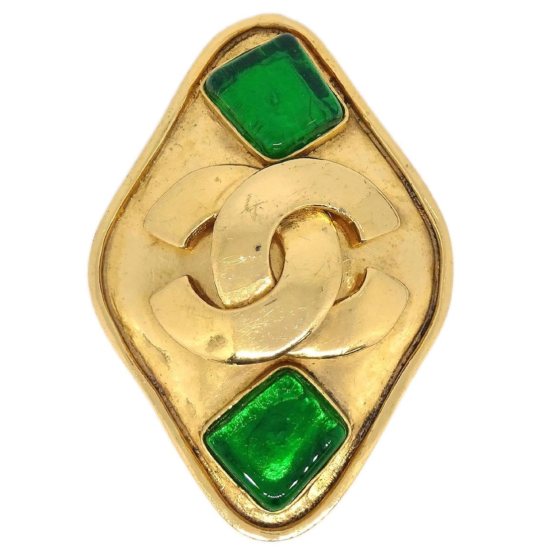 Gold Plated Chanel Rhombus Brooch with Gripoix 95P: Gold Plated Chanel Rhombus Brooch with Gripoix 95P This Chanel brooch features a rhombus shape with a gold-plated finish, showcasing the iconic Gripoix design from the 1995 Spring collection. Made in 