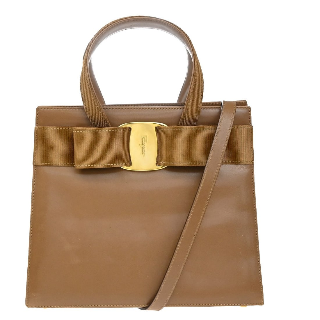 Salvatore Ferragamo Leather Convertible Vara Bow Tote Bag: Salvatore Ferragamo Leather Convertible Vara Bow Tote Bag This Salvatore Ferragamo Convertible Vara Bow Tote is crafted from brown leather and designed for women. The tote features a classic Vara bow 