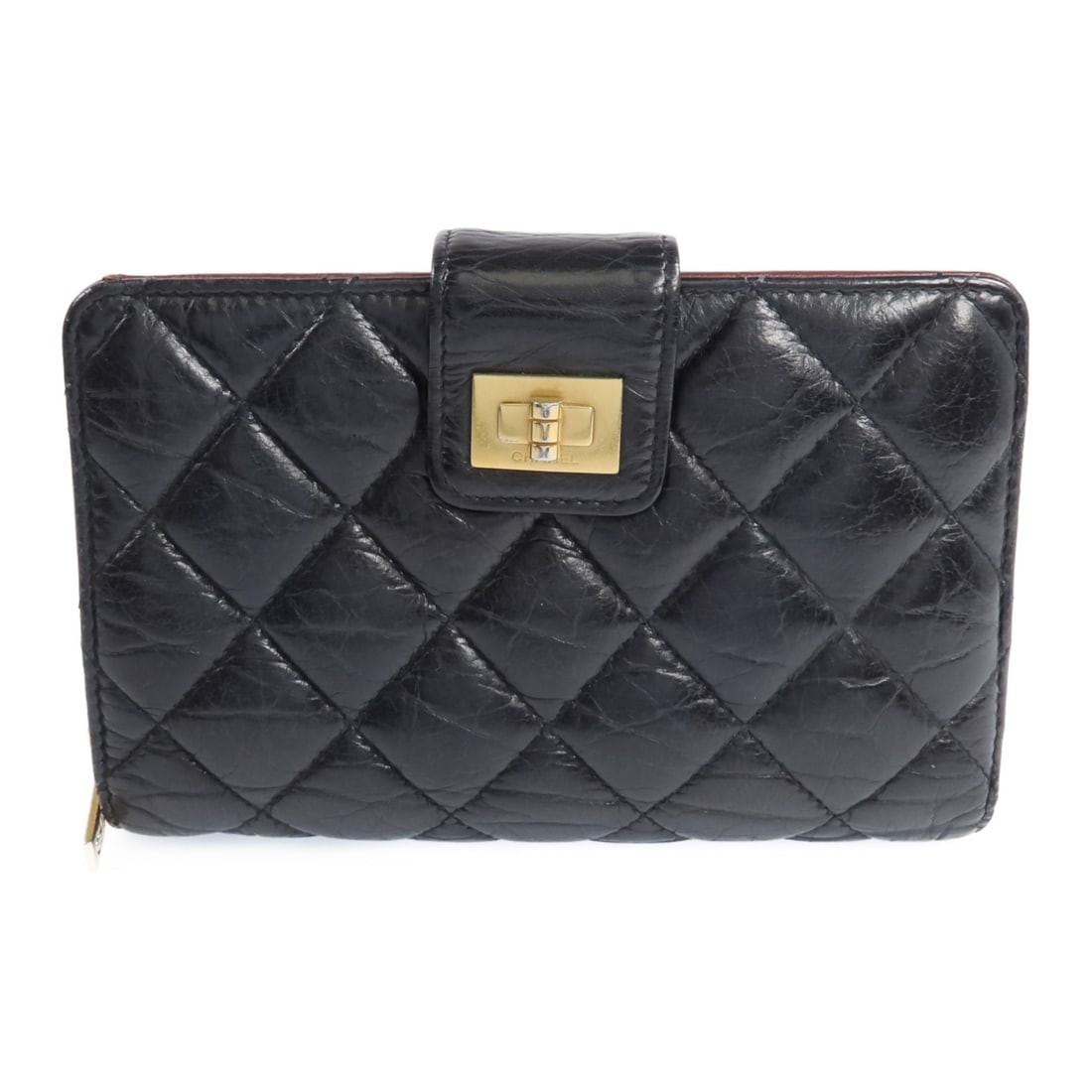 Chanel 2.55 Black Calfskin Bi-fold Wallet with Gold Tone CC: Chanel 2.55 Black Calfskin Bi-fold Wallet with Gold Tone CC This CHANEL 2.55 bi-fold wallet is crafted from luxurious black calfskin leather. Featuring the iconic CC logo and gold hardware, it is desi