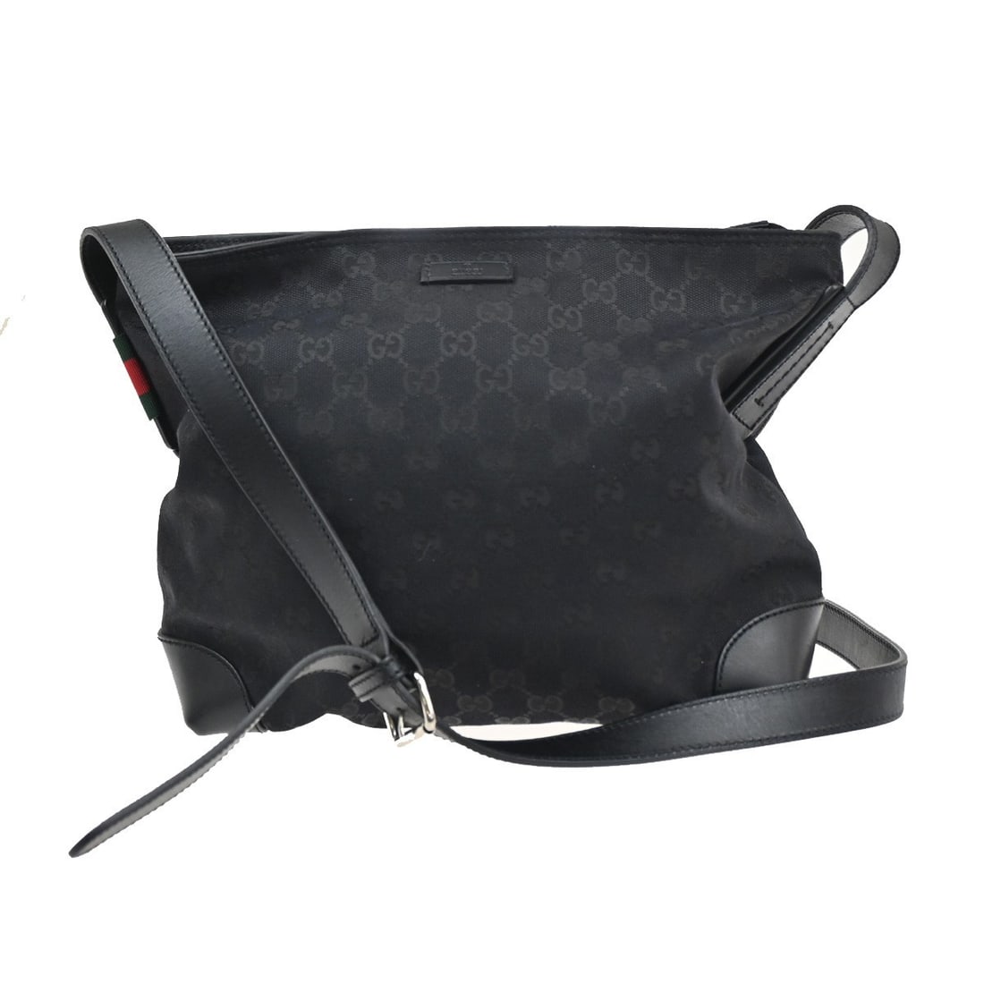 Black Canvas Gucci Messenger Bag for Women 26cm by 23cm by 9cm: Black Canvas Gucci Messenger Bag for Women 26cm by 23cm by 9cm This pre-owned Gucci Original Messenger bag for women features a black canvas construction with a compact design. It offers practical dim