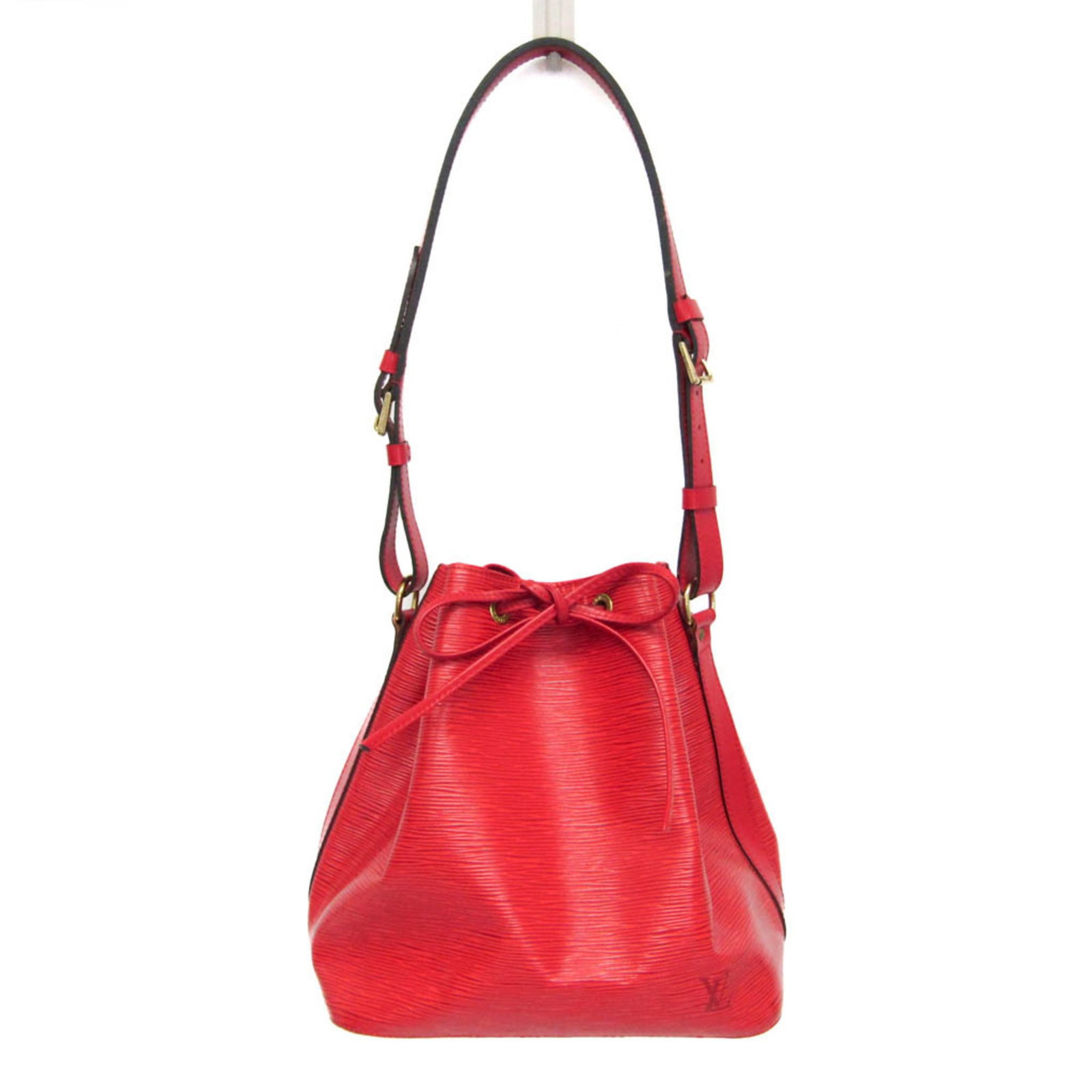 Red Epi Leather Petit Noe Shoulder Bag by Louis Vuitton: Red Epi Leather Petit Noe Shoulder Bag by Louis Vuitton This Louis Vuitton Petit Noe handbag is crafted from red Epi leather and designed for women. The bag features subtle signs of previous use, incl