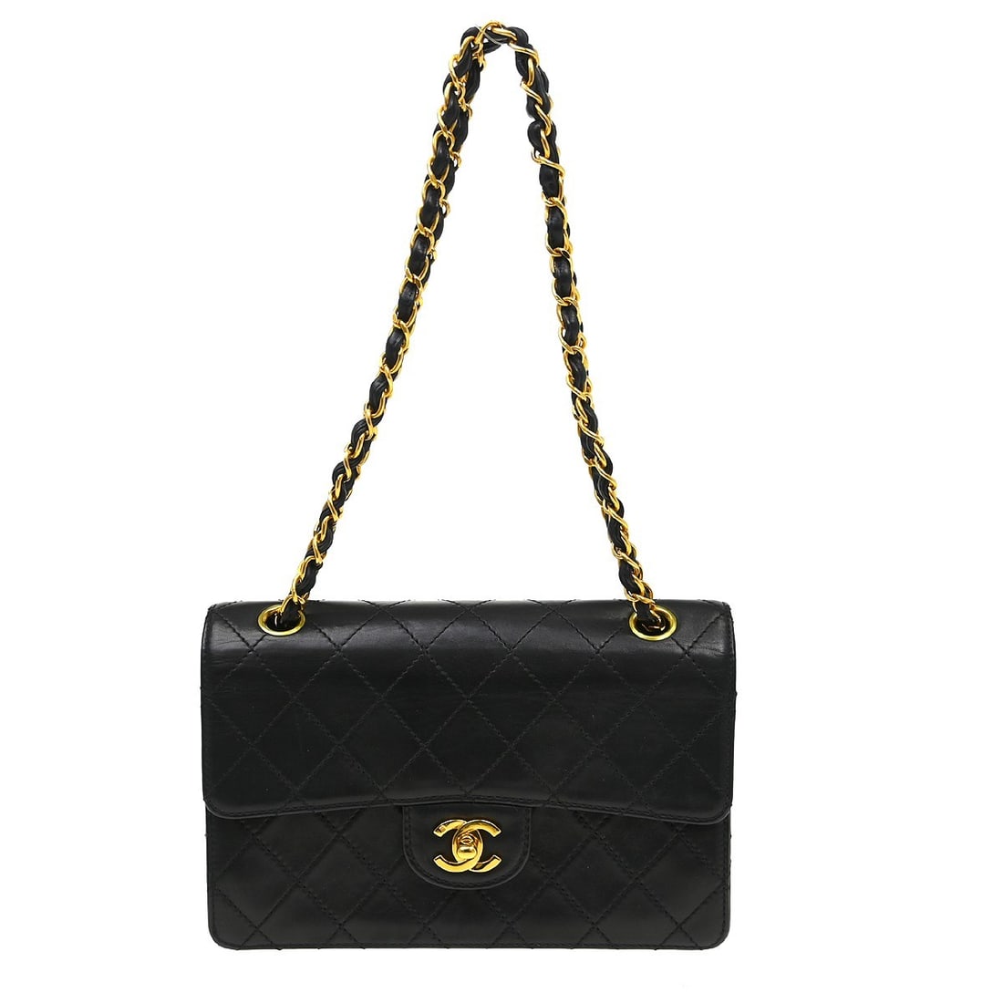 CHANEL Matelasse Black Lambskin Turnlock Shoulder Bag: CHANEL Matelasse Black Lambskin Turnlock Shoulder Bag This Chanel shoulder bag features black lambskin leather with a classic matelasse pattern and a turnlock closure. The medium-sized bag is designed