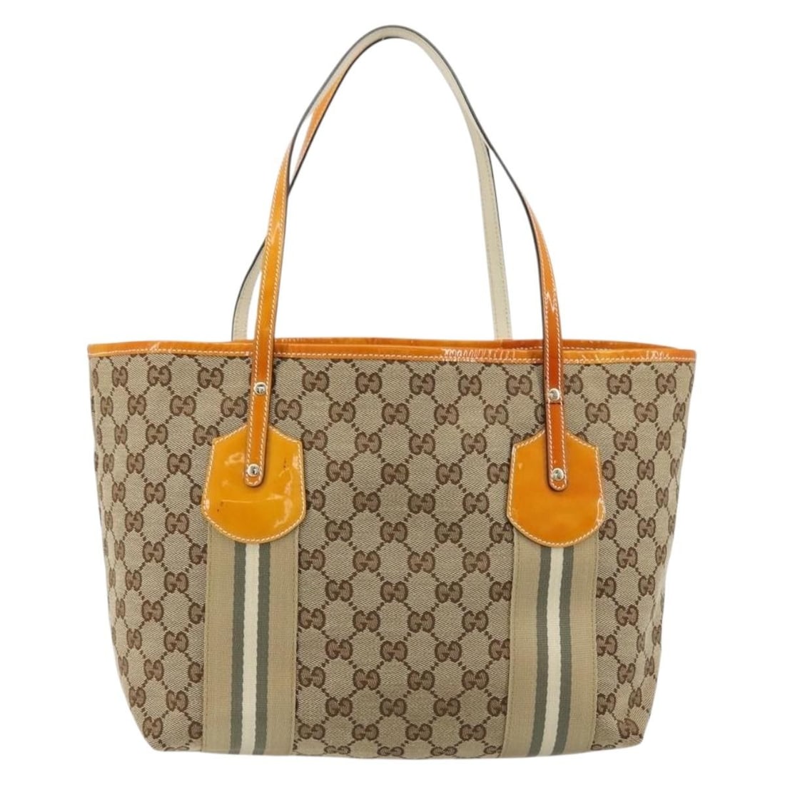 Beige Canvas Jolie Web Tote Bag by Gucci Italy: Beige Canvas Jolie Web Tote Bag by Gucci Italy The Gucci Jolie Web Tote GG Canvas is a women's handbag crafted from beige GG canvas. This tote features the classic Gucci design and is made in Italy. T