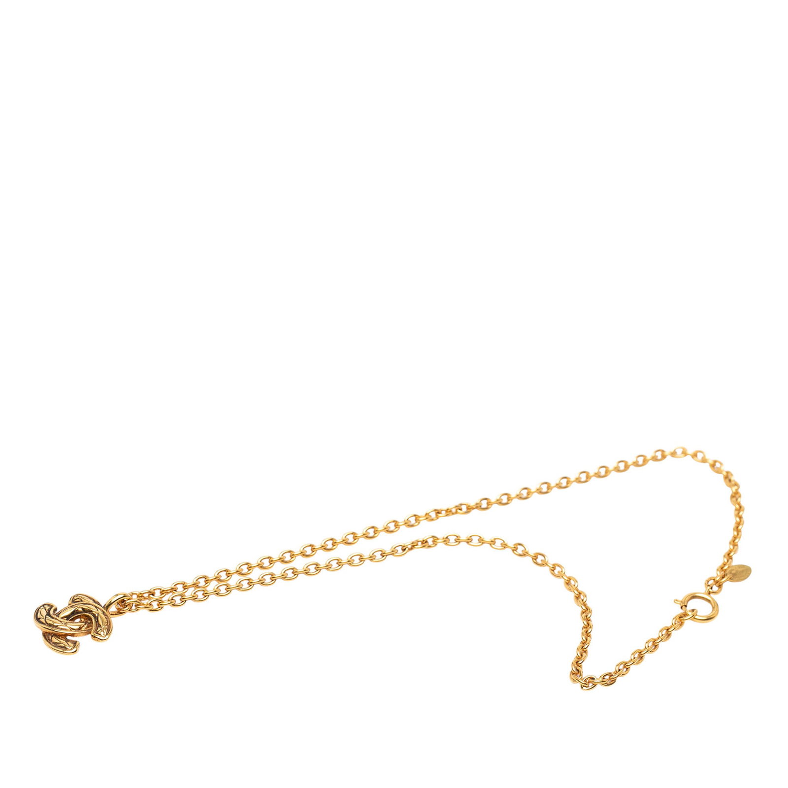 Chanel Quilted CC Pendant Necklace in Gold Plated Metal: Chanel Quilted CC Pendant Necklace in Gold Plated Metal This Chanel necklace features a gold-plated metal chain and a pendant with a quilted CC design, secured by a spring ring closure. The item shows