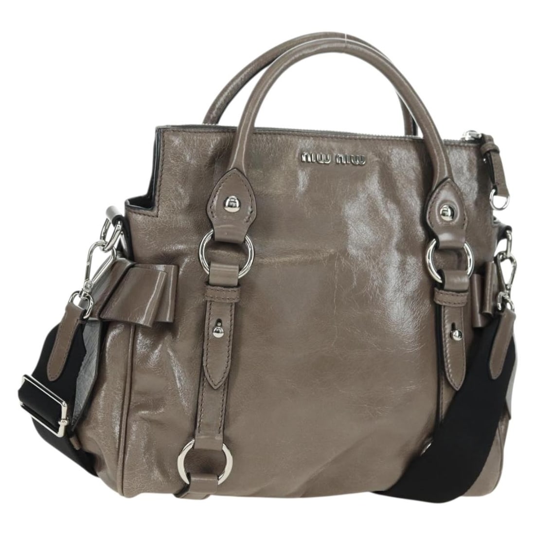 Miu Miu brown silver leather shoulder bag with strap and dust bag: Miu Miu brown silver leather shoulder bag with strap and dust bag This Miu Miu handbag is crafted from brown and silver leather and offers versatile carrying options with both handles and a detachable