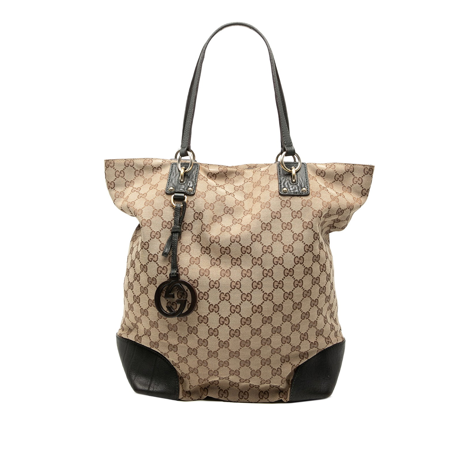 Gucci Tote Bag GG Canvas with Leather Trim and Charm Beige: Gucci Tote Bag GG Canvas with Leather Trim and Charm Beige This Gucci Large GG Canvas GG Charm Tote features a beige canvas body with leather trim, accented by a GG charm. The bag is designed with fla