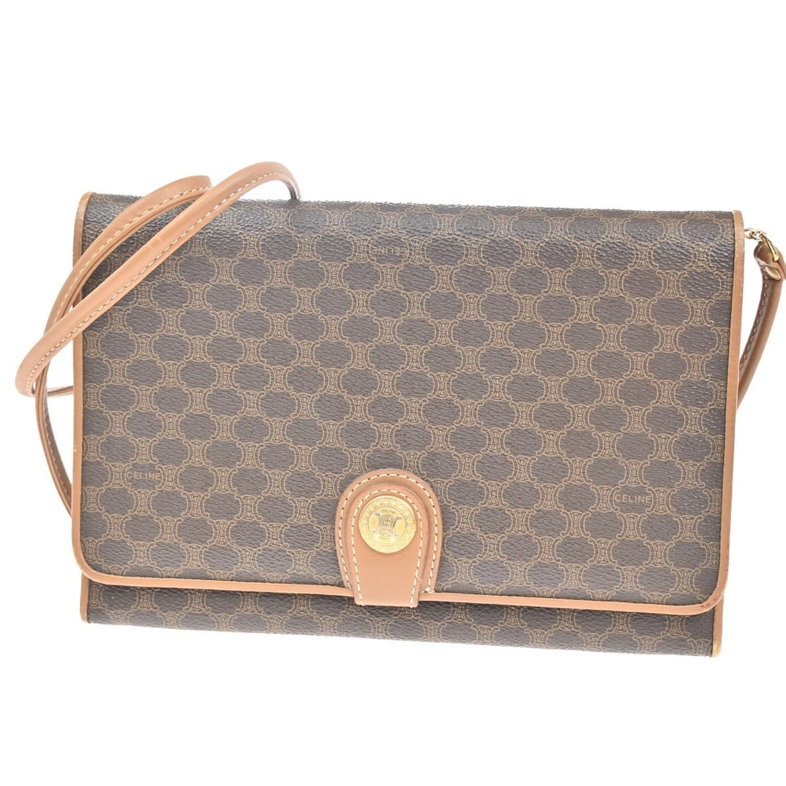 Brown PVC Celine Macadam Shoulder Bag 23cm by 18cm by 3cm: Brown PVC Celine Macadam Shoulder Bag 23cm by 18cm by 3cm This pre-owned Celine Macadam shoulder bag for women features a brown PVC exterior with a flap leather detail. Made in Italy, the bag measures