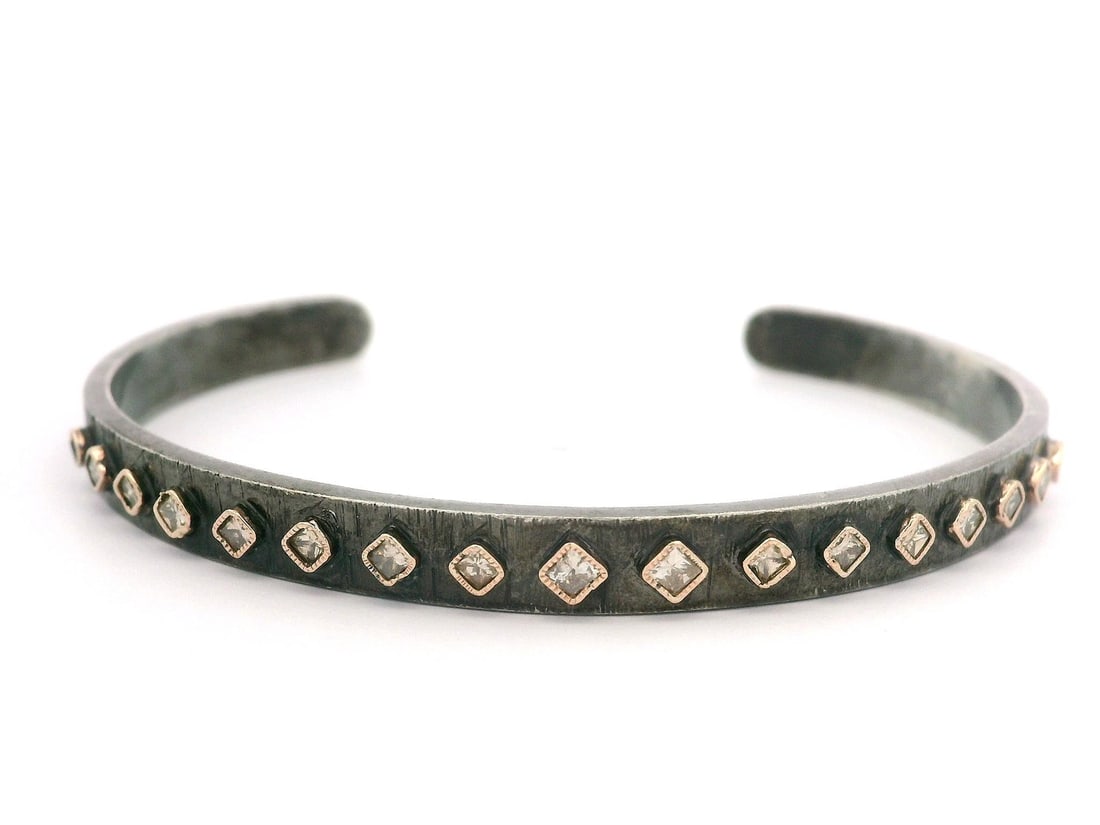 John Apel Arena 14K Rose Gold Diamond Textured Cuff Bracelet: John Apel Arena 14K Rose Gold Diamond Textured Cuff Bracelet This exquisite John Apel Arena cuff bracelet features a stunning combination of 14k rose gold accents and sterling silver, showcasing a mod