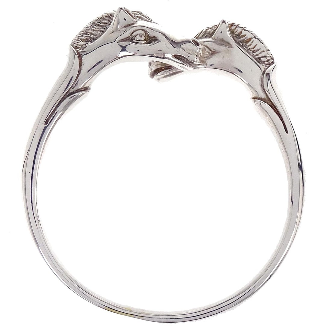 Cheval Horse Motif Silver Plated Bangle Bracelet by Hermes: Cheval Horse Motif Silver Plated Bangle Bracelet by Hermes This Hermes Cheval Horse bangle bracelet features a silver-plated finish and a classic bangle style. Made in France, it showcases the brand's