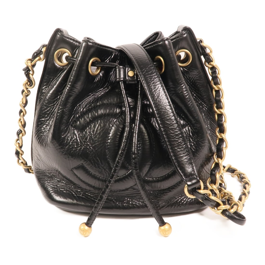 Black Calfskin CHANEL Bucket Shoulder Bag with Gold Tone Chain Hardware: Black Calfskin CHANEL Bucket Shoulder Bag with Gold Tone Chain Hardware This CHANEL CC bucket chain shoulder bag is crafted from black calfskin leather and features gold tone hardware. Designed for wo