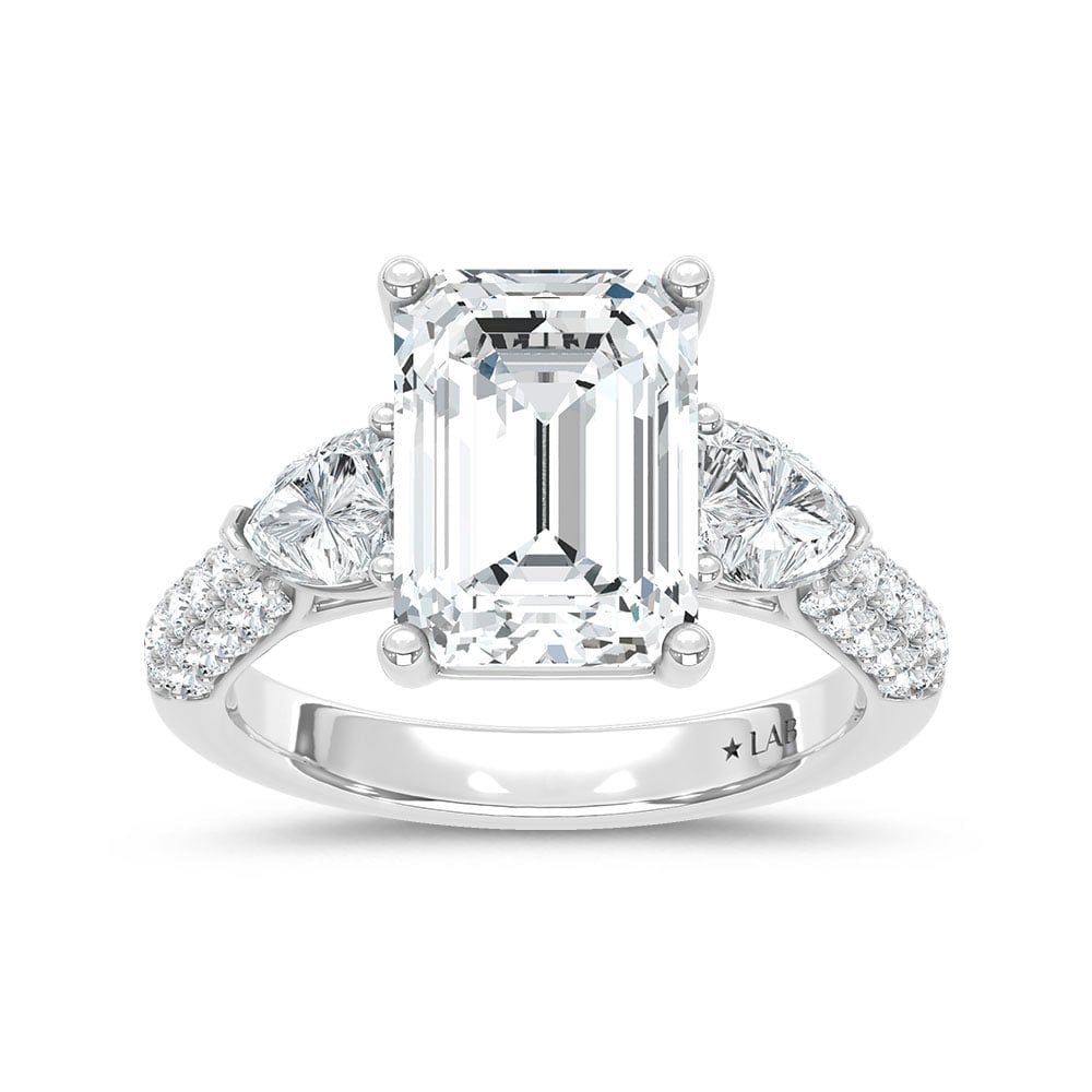 14K White Gold Lab Grown Diamond 6 3/8 Ct.Tw. Emerald and Round Shape Engagement Ring (IGI Certified: 14K White Gold Lab Grown Diamond 6 3/8 Ct.Tw. Emerald and Round Shape Engagement Ring (IGI Certified Center 5ct) This stunning three-stone ring features a sparkling 5 CT Emerald Center diamond with tw