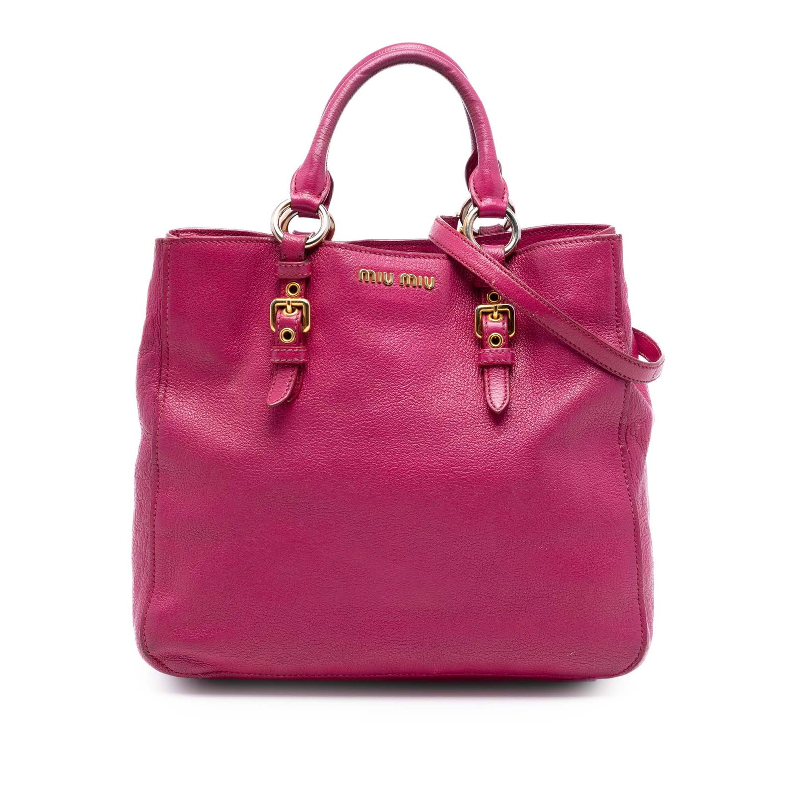 Miu Miu Madras Pink Goatskin Leather Satchel with Detachable Strap: Miu Miu Madras Pink Goatskin Leather Satchel with Detachable Strap This Miu Miu Goatskin Madras Satchel features a goatskin leather body in pink, rolled leather handles, a detachable flat leather stra