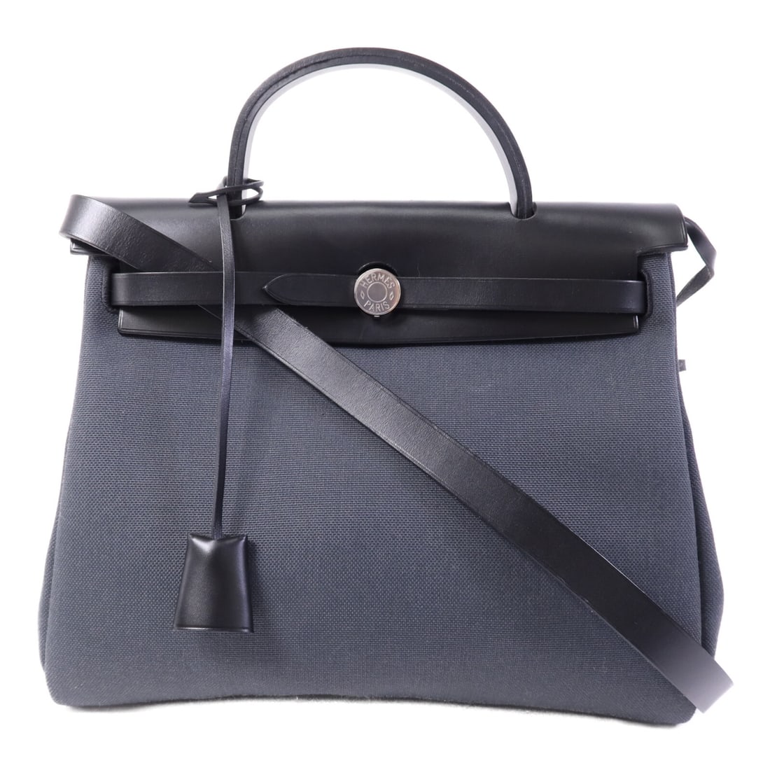 Herbag PM Gray Leather Canvas Shoulder Bag by Hermes with Palladium Hardware: Herbag PM Gray Leather Canvas Shoulder Bag by Hermes with Palladium Hardware This Hermes Herbag PM is a versatile 2-way shoulder bag crafted from premium leather and canvas in an elegant gray (Ardoise