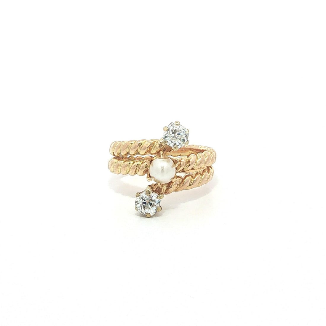 Pearl and Old Mine Cut Diamond Yellow Gold Cocktail Ring: Pearl and Old Mine Cut Diamond Yellow Gold Cocktail Ring This antique cocktail ring features a unique wrap design crafted in solid yellow gold, ranging from 16k to 18k purity. It is adorned with two n