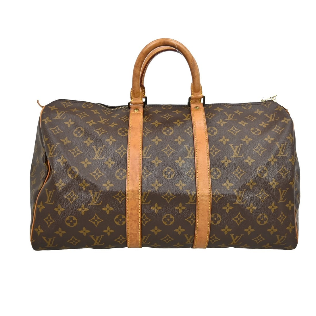 Keepall Travel Duffel in Monogram Canvas by Louis Vuitton: Keepall Travel Duffel in Monogram Canvas by Louis Vuitton This Louis Vuitton Keepall Bag features the iconic Monogram canvas in brown and is designed for unisex use. The bag shows signs of previous us