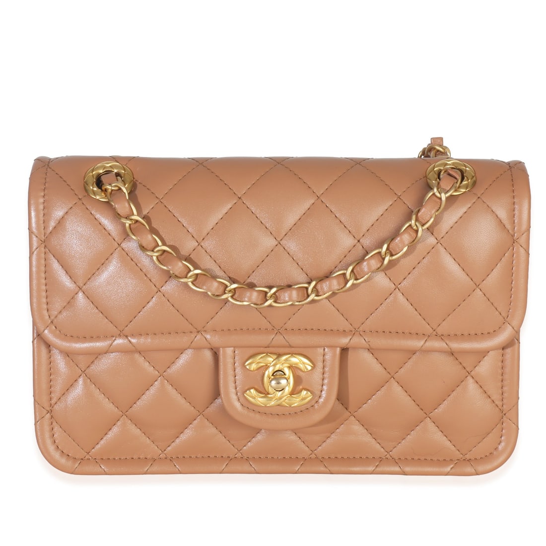 Chanel CC Flap Shoulder Bag Tan Quilted Calfskin Leather Gold-Tone Hardware: Chanel CC Flap Shoulder Bag Tan Quilted Calfskin Leather Gold-Tone Hardware This Chanel CC Flap Bag features a tan quilted calfskin leather exterior with a classic turnlock closure. The interior is li