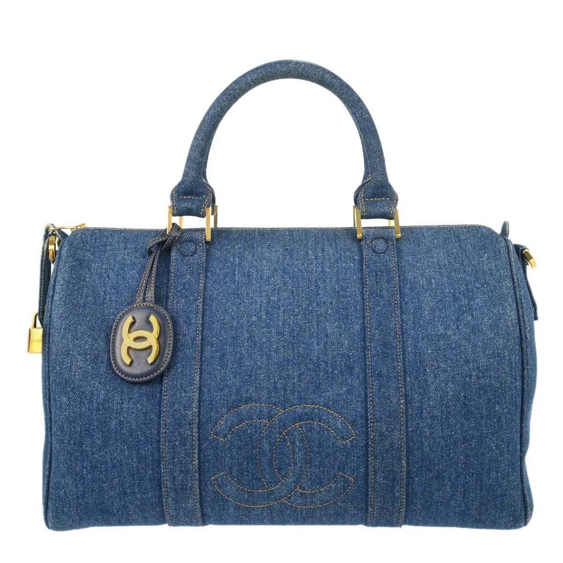 CHANEL Blue Denim Women Duffle Bag Vintage Large Zip Pockets: CHANEL Blue Denim Women Duffle Bag Vintage Large Zip Pockets This Chanel blue denim duffle handbag features a spacious large size with double handles and a zip closure, making it ideal for casual occa