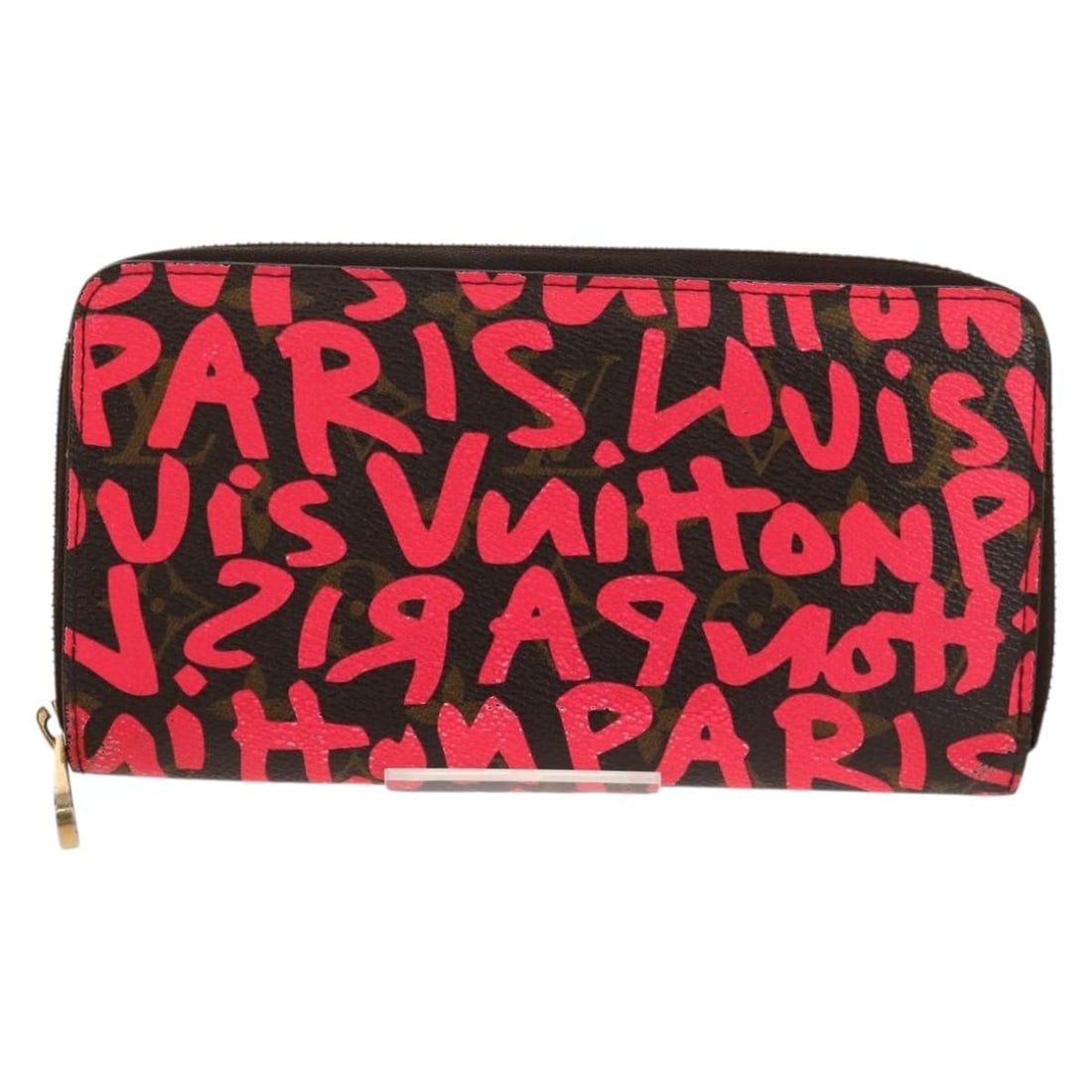 Pink Canvas Zippy Wallet by Louis Vuitton for Women: Pink Canvas Zippy Wallet by Louis Vuitton for Women This Louis Vuitton Zippy wallet is crafted from pink canvas and designed for women. The wallet features a zip-around closure and multiple interior c