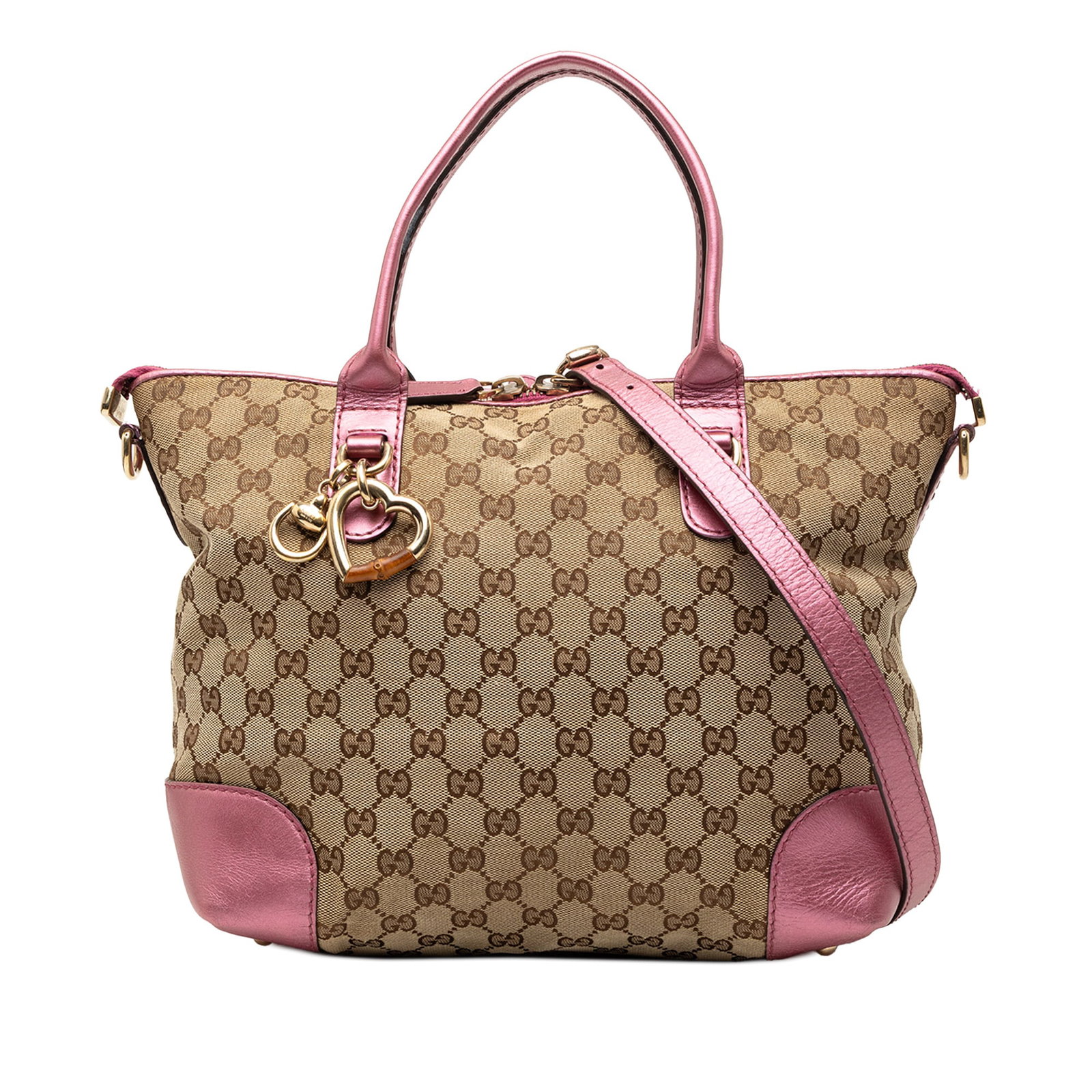 Gucci Beige Canvas Satchel with Heart Bit Accent and Leather Trim: Gucci Beige Canvas Satchel with Heart Bit Accent and Leather Trim This Gucci GG Canvas Heart Bit Satchel features a canvas body with leather trim, flat leather handles, a top zip closure, and interior