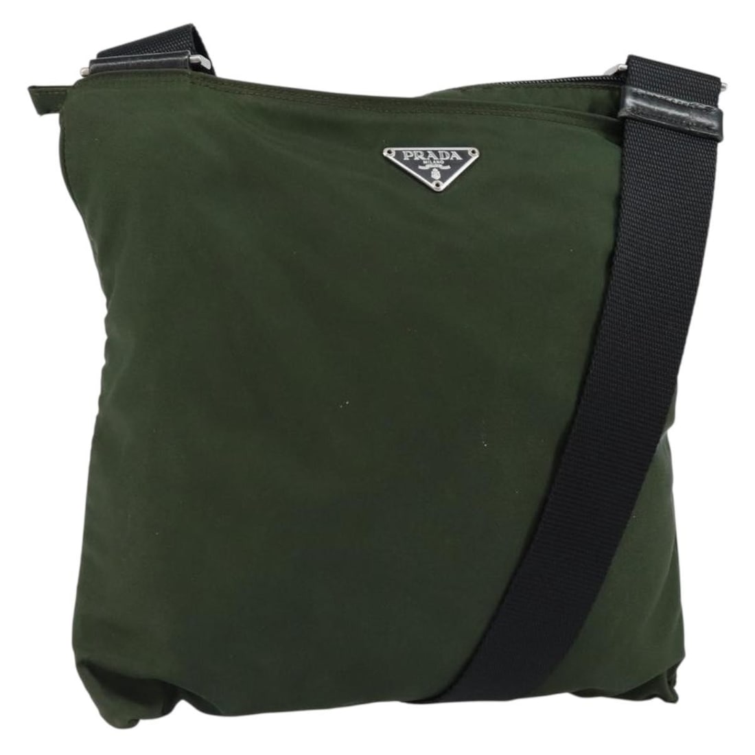 Prada Tessuto Khaki Unisex Nylon Flat Messenger Shoulder Bag: Prada Tessuto Khaki Unisex Nylon Flat Messenger Shoulder Bag This is a Prada Flat Messenger Bag crafted from durable khaki nylon, designed for unisex use. The pre-owned bag is in good condition, with 