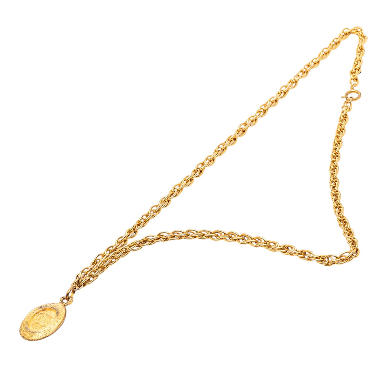 Chanel Medallion Pendant Necklace with Gold Tone Chain: Chanel Medallion Pendant Necklace with Gold Tone Chain This Chanel necklace showcases a gold-tone medallion pendant suspended from a matching gold-tone chain, completed with a spring ring closure. The