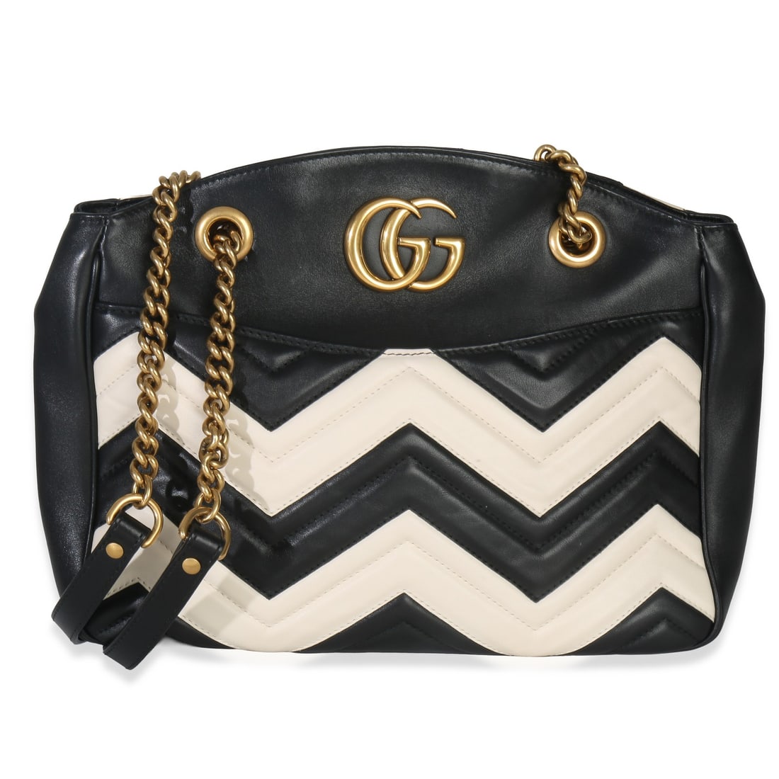 Gucci Medium GG Marmont Black and White Leather Chain Tote Handbag: Gucci Medium GG Marmont Black and White Leather Chain Tote Handbag This Gucci Medium GG Marmont Chain Tote features a black and white matelasse leather exterior with gold-tone hardware. The tote is de