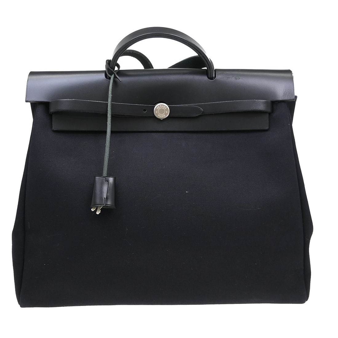 Herbag Cabas Black Canvas Tote Bag by Hermes France: Herbag Cabas Black Canvas Tote Bag by Hermes France This Hermes Herbag Cabas is crafted from black canvas with leather accents. Designed for women, it features a spacious interior suitable for daily u
