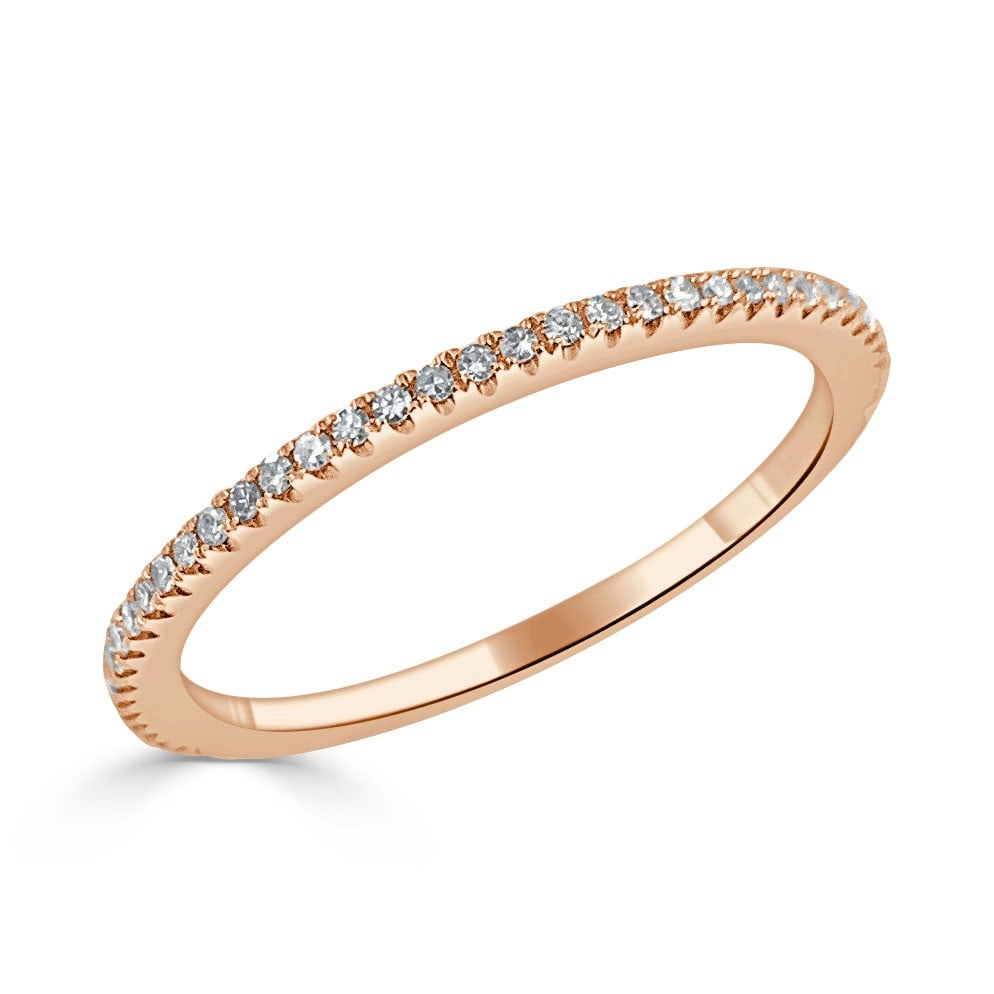Women's 14k Rose Gold Diamond Eternity Ring Size 6: Women's 14k Rose Gold Diamond Eternity Ring Size 6 This pre-owned women's eternity band features 66 round white diamonds with a total side stone weight of 0.18 carats, set in 14k rose gold. The diamon