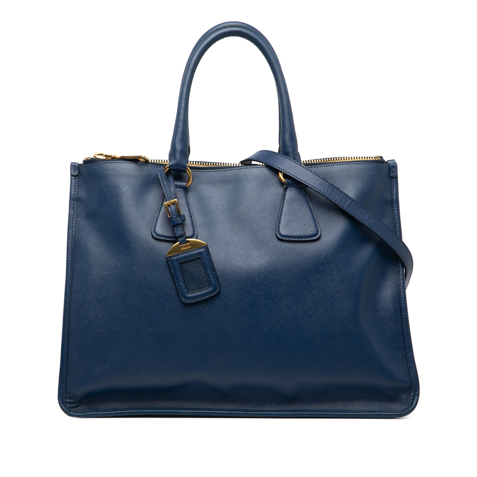 Prada Saffiano Double Zip Convertible Tote in Blue Leather: Prada Saffiano Double Zip Convertible Tote in Blue Leather This Prada Saffiano Double Zip Open Convertible Tote is a stylish and functional satchel crafted from durable saffiano leather. It features r