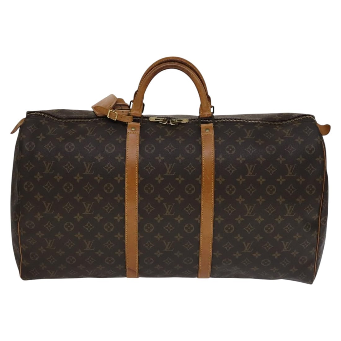 Keepall Travel Bag in Monogram Canvas by Louis Vuitton: Keepall Travel Bag in Monogram Canvas by Louis Vuitton This Louis Vuitton Keepall Bag features the iconic monogram canvas design in brown. Suitable for all genders, it is crafted in France and offers 