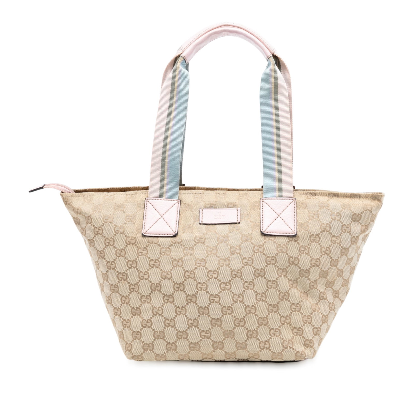 Beige GG Canvas Web Tote Bag with Leather Trim by Gucci: Beige GG Canvas Web Tote Bag with Leather Trim by Gucci This Gucci GG Canvas Web Tote features a beige canvas body with leather trim and flat canvas straps. The bag is designed with a top zip closure 