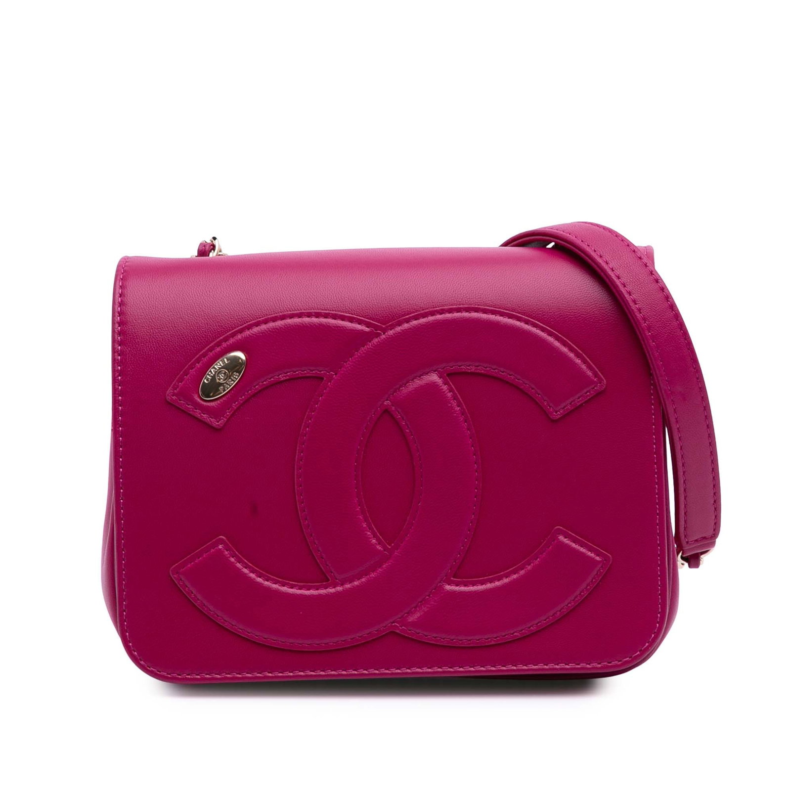 Chanel Pink Lambskin CC Mania Flap Bag with Leather Strap: Chanel Pink Lambskin CC Mania Flap Bag with Leather Strap Elevate your accessory collection with the Chanel Lambskin CC Mania Flap bag. This exquisite piece features a luxurious lambskin leather body 