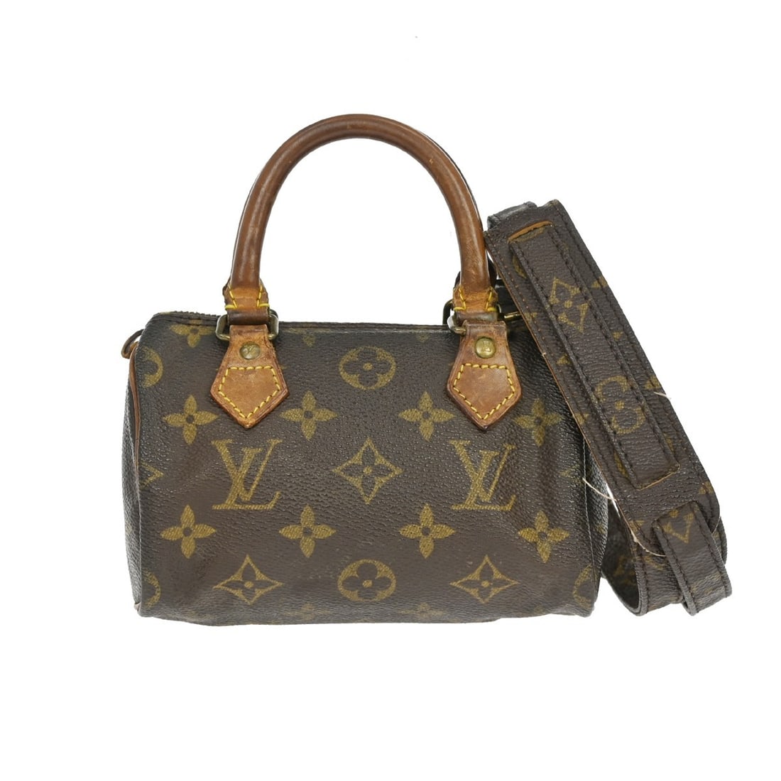 Louis Vuitton Mini Monogram Speedy Brown Canvas 2Way Handbag M41534: Louis Vuitton Mini Monogram Speedy Brown Canvas 2Way Handbag M41534 This Louis Vuitton Monogram Mini Speedy 2-way handbag features the iconic monogram canvas leather in brown with matching brown linin