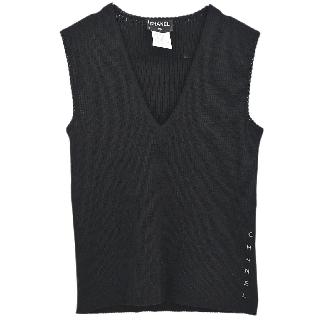 Chanel Black Wool Sleeveless Tank Top Size 42: Chanel Black Wool Sleeveless Tank Top Size 42 This Chanel sleeveless top features a V-neck design and is crafted from 100% wool in black. Designed for women, it offers a regular fit and is adorned wit