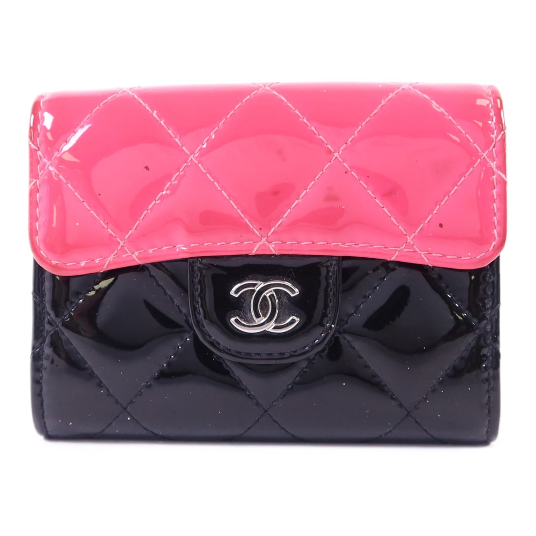 Black and Pink Patent Leather Card Holder by CHANEL with Silver CC Logo: Black and Pink Patent Leather Card Holder by CHANEL with Silver CC Logo This CHANEL card case features black patent leather with pink accents and silver-tone hardware. Designed for practical everyday 