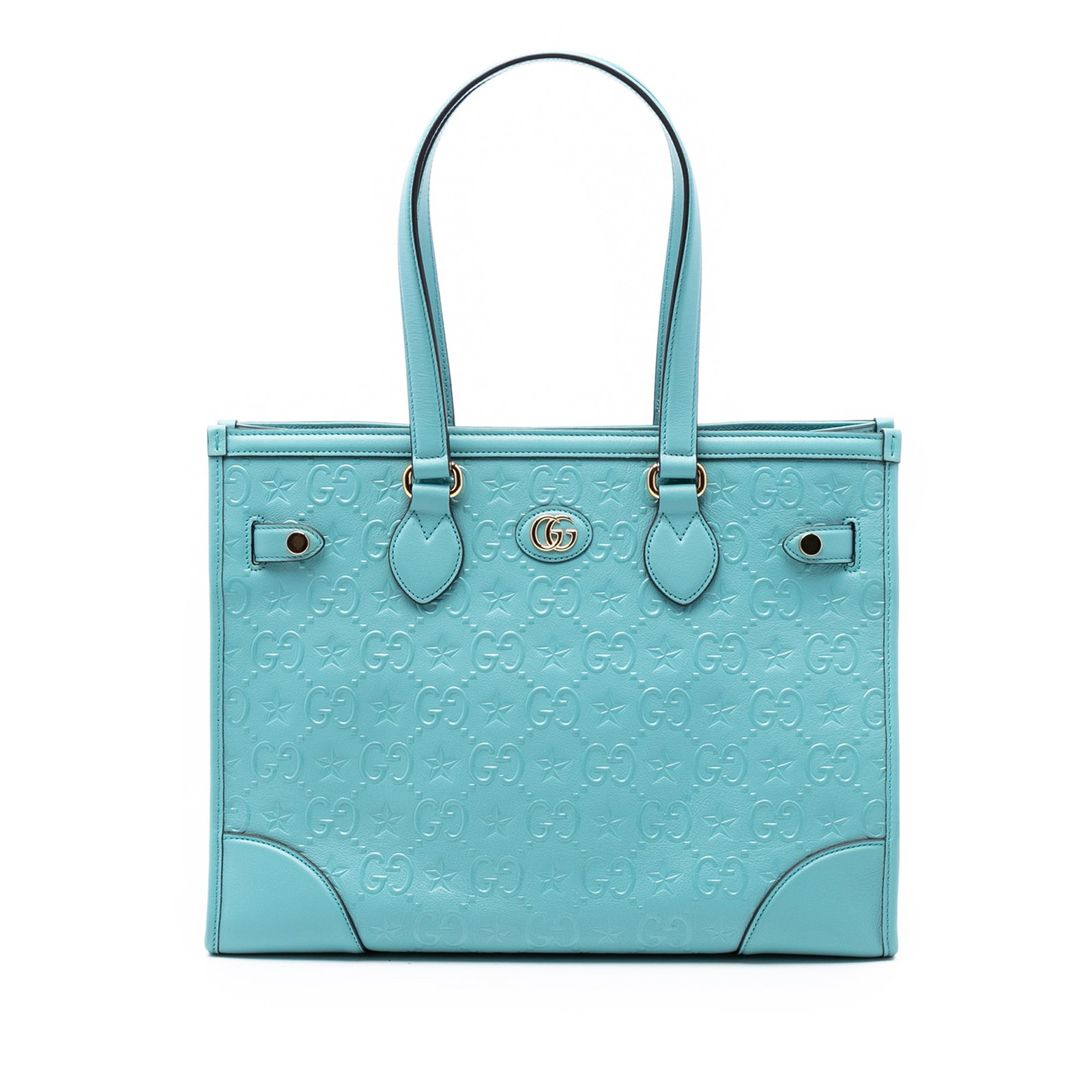Blue GG Star Embossed Leather Tote Bag by Gucci: Blue GG Star Embossed Leather Tote Bag by Gucci This Gucci GG Star Embossed Leather Tote features an embossed leather body with a star motif, flat leather straps, an open top with a snap closure, and 