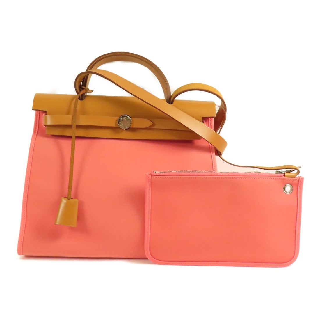 Hermes Herbag PM Pink Canvas 2 Way Shoulder Handbag: Hermes Herbag PM Pink Canvas 2 Way Shoulder Handbag This Hermes Herbag PM is a versatile 2-way shoulder handbag crafted from durable canvas in a striking Rose Azalee (pink) color. Designed for women, 
